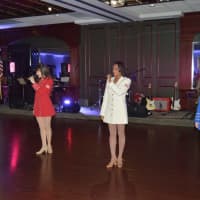 <p>The USO Show Troupe, which is also celebrating its 75th year, performs at the Hat City Ball.</p>