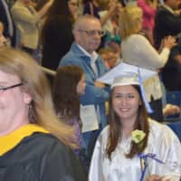 <p>Students and staff make their entrance for the Newtown High graduation.</p>