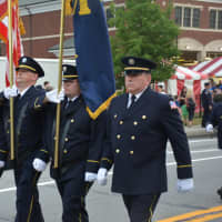 <p>Montrose firefighters march in the Mahopac Volunteer Fire Department&#x27;s dress parade.</p>