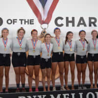 <p>Saugatuck Rowing Club&#x27;s women’s youth 8+ brings home the gold medal at the Head of the Charles Regatta, the crew’s fourth win in a row. See story for IDs.</p>