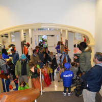<p>Dozens of kids in costume, along with their parents, showed up on a rainy Thursday afternoon to Westport Town Hall to the annual Halloween trick-or-treat event.</p>