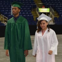 <p>Graduates entering the Webster Bank Arena for the Bassick High graduation on Tuesday morning.</p>