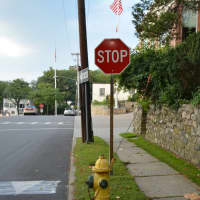 <p>A new stop sign has been added to an intersection by the Bedford Hills firehouse.</p>