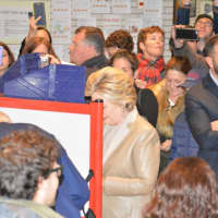 <p>Hillary Clinton, pictured at her voting space in Chappaqua, where she cast her vote for president.</p>
