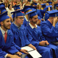 <p>A group of happy graduates at the Abbott Tech High School commencement.</p>