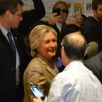 <p>Hillary Clinton walks through the auditorium of Douglas G. Grafflin Elementary School in Chappaqua, where she cast her presidential vote last Tuesday.</p>