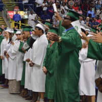 <p>Students anxiously awaiting their diplomas at the Bassick High graduation Tuesday.</p>