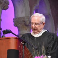 <p>Kim Piccolino and Gil Cass, John Jay High School&#x27;s co-interim principals, deliver their remarks at the 2016 commencement.</p>