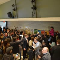 <p>A large crowd gathers in the auditorium/voting room at Douglas G. Grafflin Elementary School in Chappaqua to see Hillary and Bill Clinton cast their presidential votes.</p>