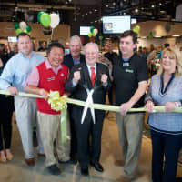 <p>Fairfield First Selectman Mike Tetreau (with scissors) cuts the ribbon to officially open the new bfresh grocery store.</p>
