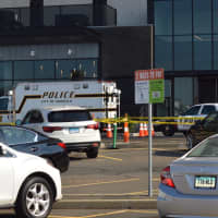 <p>Norwalk police investigate the robbery of the Chase Bank on Washington Street in South Norwalk Wednesday.</p>