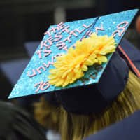 <p>A colorful mortarboard at the New Fairfield High graduation</p>