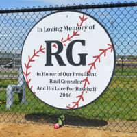 <p>The banner in the outfield at PPL Little League Field honoring Raul Gonzalez.</p>