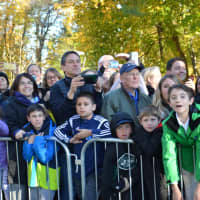 <p>Throngs of supporters gather in front of Douglas G. Grafflin Elementary School for Hillary and Bill Clinton after the pair cast their presidential votes.</p>