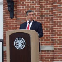 <p>First Selectman Rob Mallozzi offers remarks at the Sept. 11 ceremony.</p>