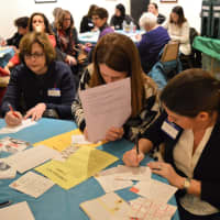 <p>Women for Progress pen postcards and letters to legislators and corporate leaders.</p>
