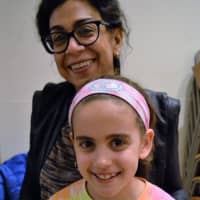 <p>Young daughters and granddaughters are welcome at Women for Progress meetings. Here is executive committee member Nayla Bahri of Wyckoff and her 8-year-old daughter, Lana.</p>