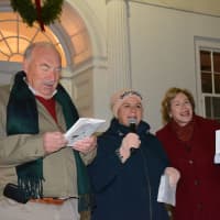 <p>Left to right: Mount Kisco Mayor Michael Cindrich, his wife, Linda and Village Trustee Jean Farber. The three are pictured at the annual Christmas tree lighting ceremony.</p>