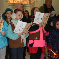 <p>Kids sing a carol at Mount Kisco&#x27;s Christmas tree lighting ceremony.</p>