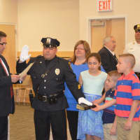 <p>East Rutherford Police Sgt. Felix Ragozzino is sworn.</p>