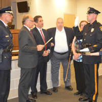 <p>East Rutherford Police Detective Sgt. Danny Perry is sworn.</p>