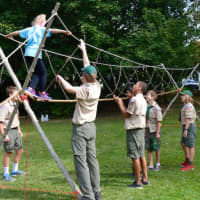 <p>Darien Boy Scouts lead a ropes course</p>