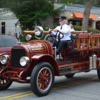 <p>An antique Millwood firetruck is driven in the Mount Kisco Fire Department&#x27;s parade.</p>