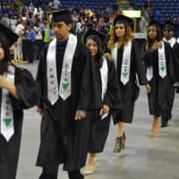 <p>The students get ready to take their seats for the commencement exercises.</p>