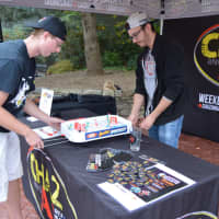 <p>Chaz from the Chaz and AJ Show on 99.1-FM WPLR plays music and games at the Newtown event.</p>