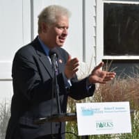 <p>Michael Kaplowitz, chair of the Westchester County Board of Legislators, speaks at the Muscoot Farm renaming ceremony in Somers. The farm was renamed in honor of the late County Executive Al DelBello.</p>