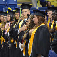 <p>The graduates are all in a line from Fairchild Wheeler High in Bridgeport.</p>