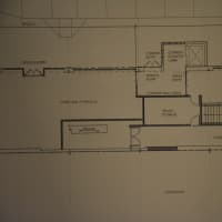<p>A photo of a proposed floor plate for the former Borders site. Modell&#x27;s would move into space pictured at upper right, while another tenant would use space pictured at left. A common corridor is pictured at lower right.</p>