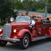 <p>An antique Chappaqua firetruck is driven in the Mount Kisco Fire Department&#x27;s parade.</p>