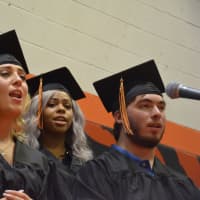 <p>Members of Pawling High School&#x27;s Class of 2016 sing a rendition of Paul Simon&#x27;s &quot;Bridge Over Troubled Water&quot; at their commencement.</p>
