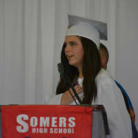 <p>Julia Claire O&#x27;Sullivan, senior class vice president, directs the pledge of allegiance at Somers High School&#x27;s 2016 commencement.</p>