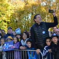 <p>Throngs of supporters gather in front of Douglas G. Grafflin Elementary School for Hillary and Bill Clinton after the pair cast their presidential votes.</p>