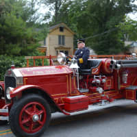 <p>An antique Katonah firetruck is driven in the Mount Kisco Fire Department&#x27;s annual parade.</p>