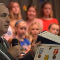 <p>Joseph Squeo, a fifth grade teacher at Royle Elementary School, was honored during the school&#x27;s Veterans Day ceremony Wednesday morning.</p>