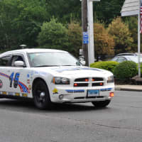 <p>Police Tribute Car honors Kenny Bateman, a Darien policeman killed in the line of duty in 1981. Kenny&#x27;s badge number was 15.</p>