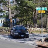 <p>A Stamford police cruiser blocked Wedgemere Road Tuesday afternoon. Police are investigating an officer-involved shooting that occurred Monday night.</p>