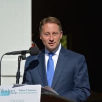 <p>Westchester County Executive Rob Astorino speaks at the renaming dedication at Muscoot Farm in Somers. The farm was officially renamed in honor of one of his predecessors, Al DelBello.</p>