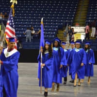 <p>The graduates file in for the Harding High graduation at the Webster Bank Arena.</p>