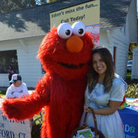 <p>Elmo greets his fans at the Great Pumpkin Festival at Boothe Memorial Park.</p>