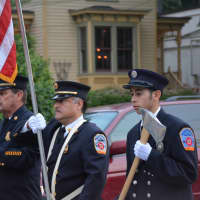 <p>Pleasantville firefighters march in the Mount Kisco Fire Department&#x27;s annual parade.</p>