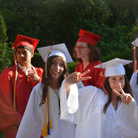 <p>Newly minted Fox Lane High School graduates ready for the 2016 commencement.</p>