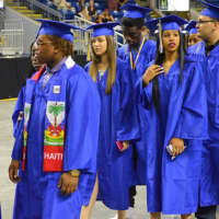 <p>Students file in for the Warren Harding High School graduation.</p>