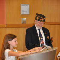 <p>Cadet Scout, Morgan Mohr from Troop 50167 reads Lincoln&#x27;s Gettyburg Address at the Memorial Day Ceremony</p>