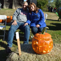 <p>This couple show off their carved creation at the Great Pumpkin Festival at Boothe Memorial Park.</p>