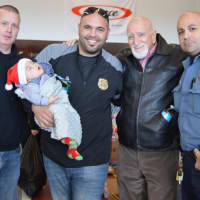 <p>From left: Fairview Police Capt. Dave Brennan, Palisades Park Police Officer Michael DeBartolo -- with Michael Jr. -- Dominic &quot;Uncle Junior&quot; Chianese, Norwood Sgt. Paul Capu.</p>
