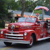 <p>An antique firetruck from Westerly, R.I. is driven in the Mount Kisco Fire Department&#x27;s annual parade.</p>